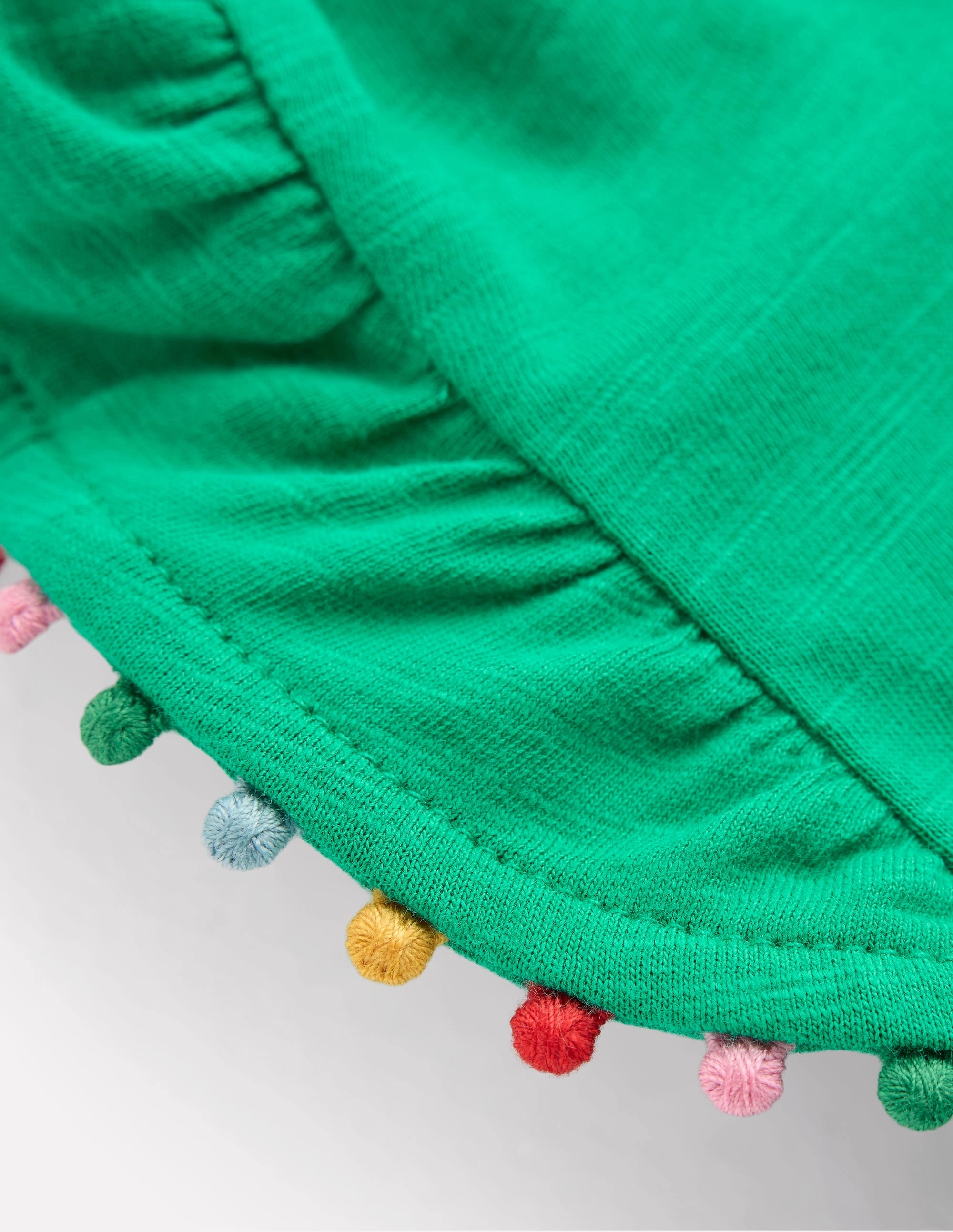 AntiSnag Fabric Organic Cotton Blend Frill Sleeve Pom Top-Bright Emerald