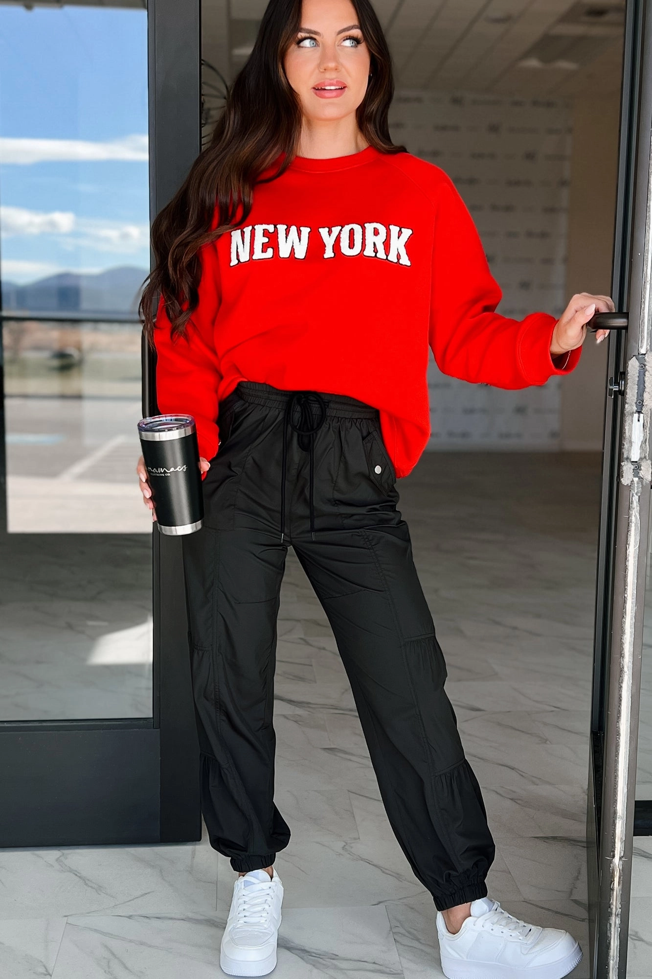 The City That Never Sleeps "New York" Raglan Sweatshirt (Red) ZeroWasteProduction Adjustable Hem