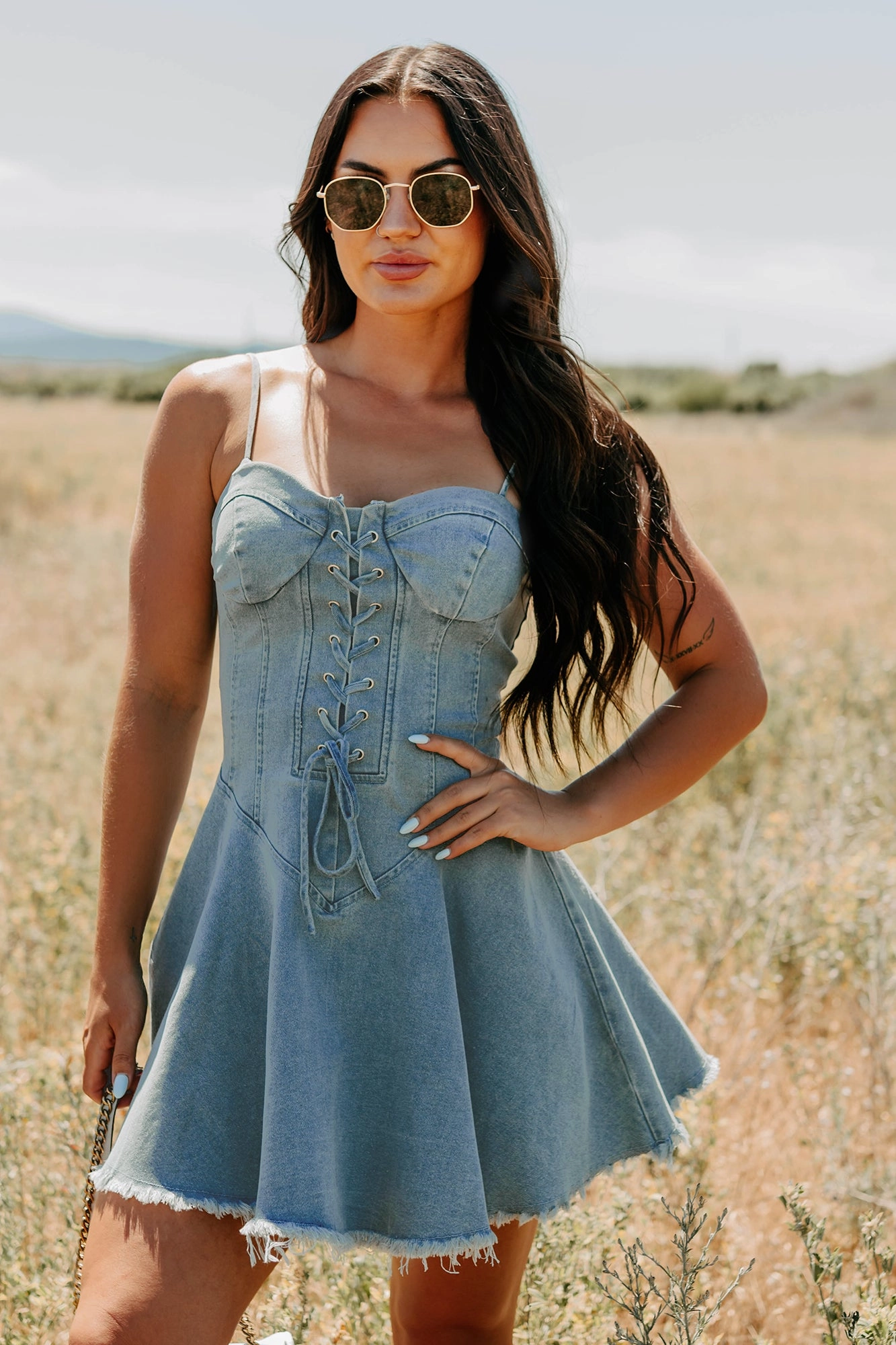 Watch Her Rise Sleeveless Denim Mini Dress (Denim) Matte-finish
