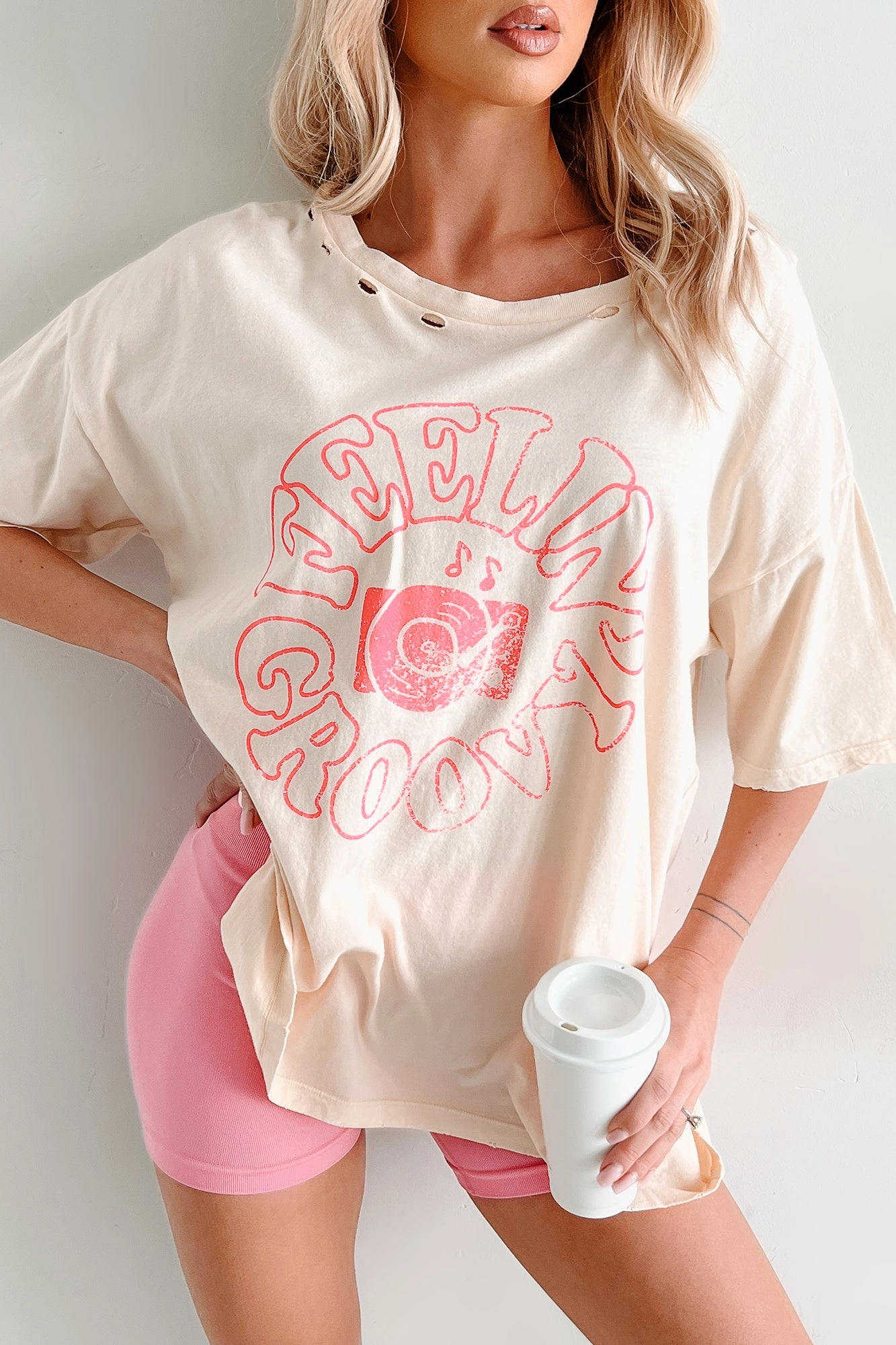 "Feelin' Groovy" Distressed Graphic T-Shirt (Vanilla) Petal Sleeve Architecture Hidden Storage Pocket