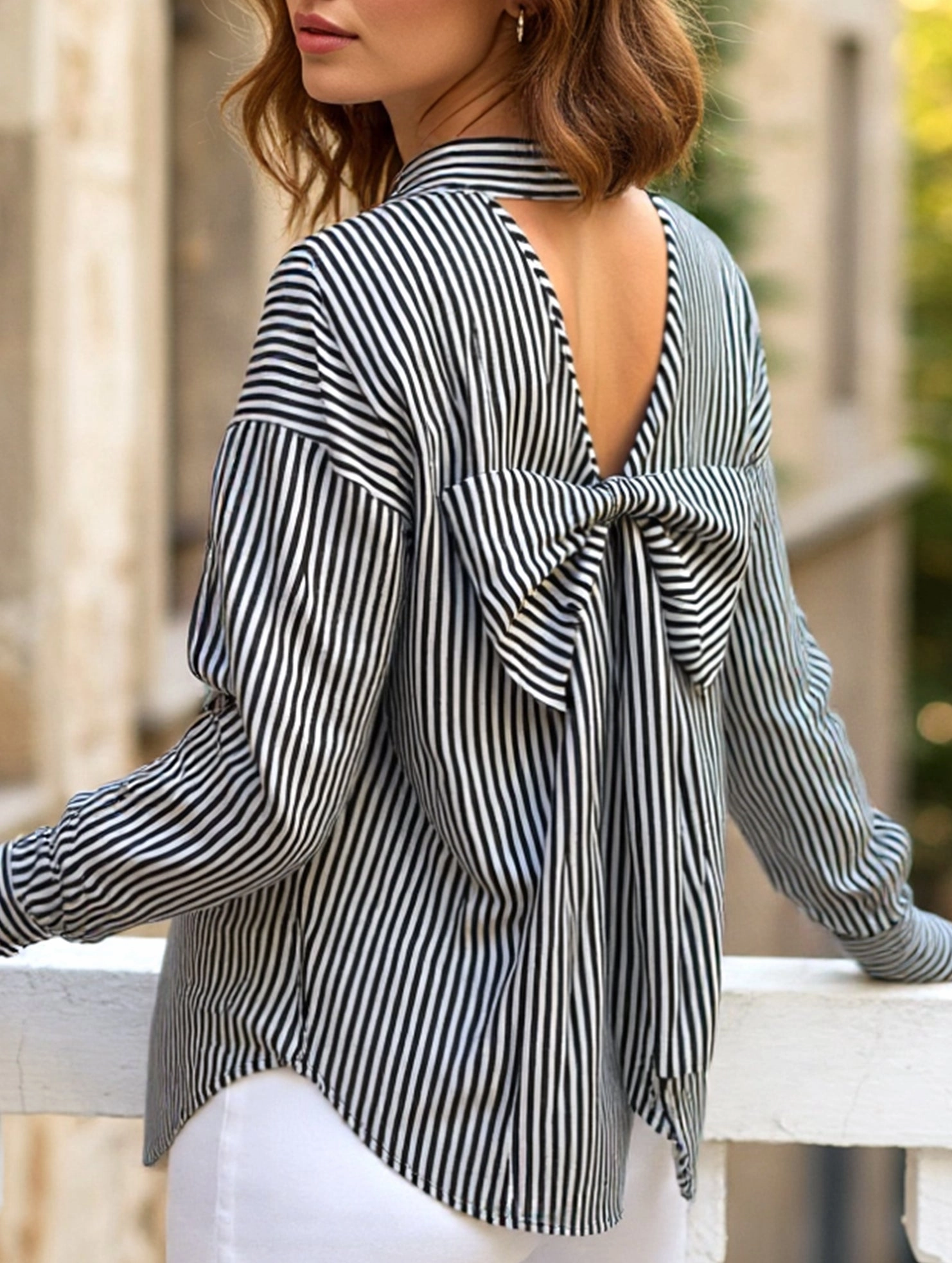 DurableReinforcement AntiPillingFinish A striped printed long-sleeved shirt with a bow