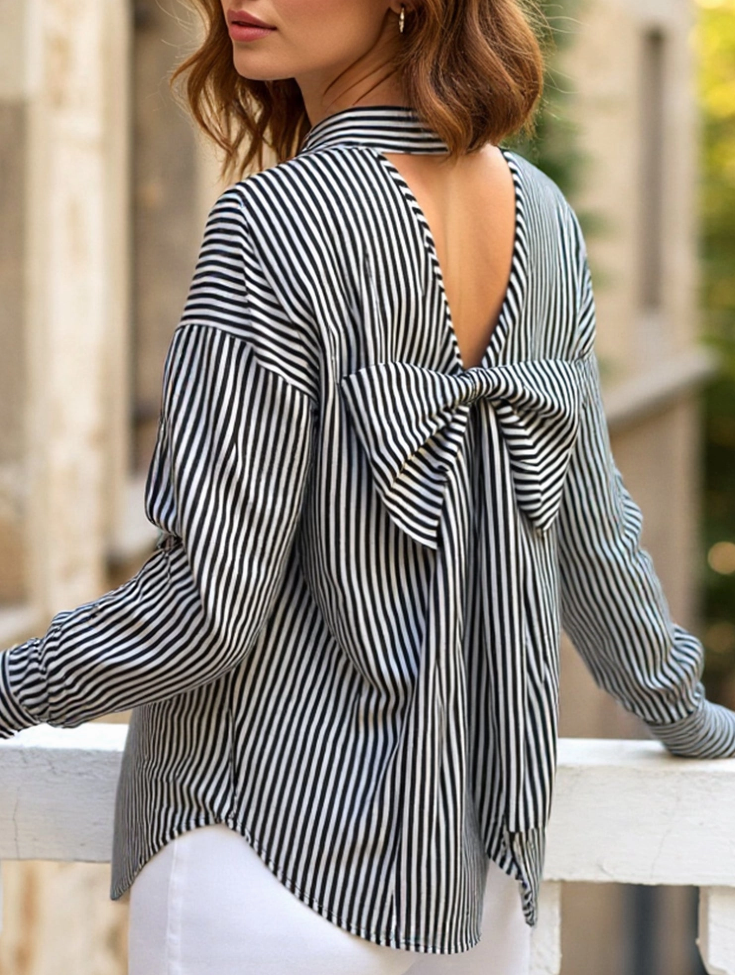 Compact TravelFriendly Design UVProtection Coating A striped printed long-sleeved shirt with a bow
